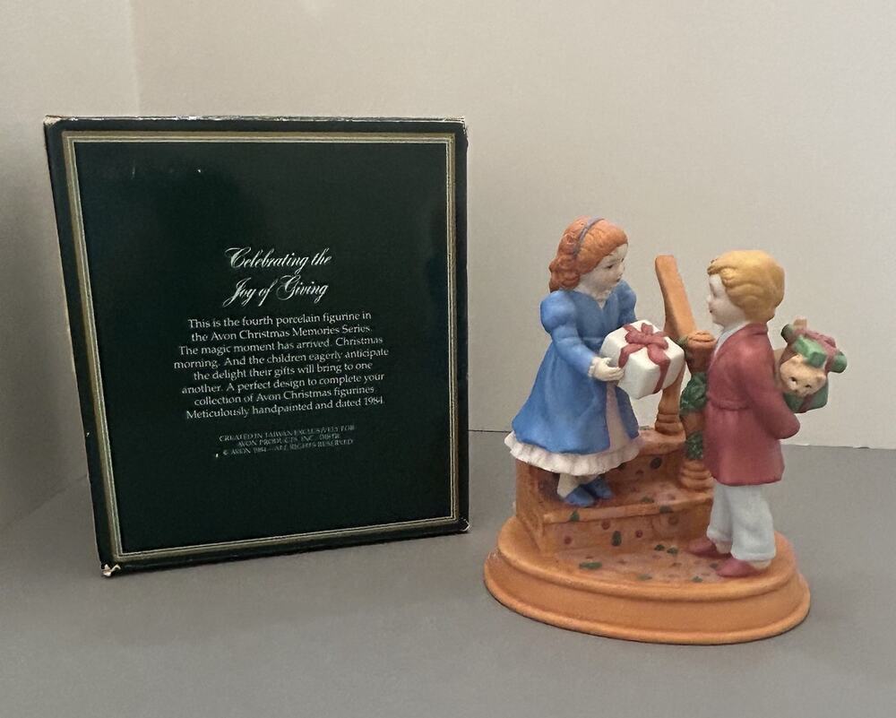 1984 Avon Christmas Memories Series Celebrating Joy Giving Porcelain Figurine